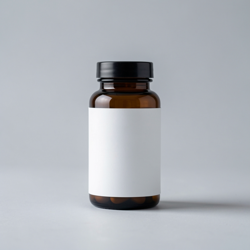 Dark amber supplement bottle with minimal label standing upright on a pale grey surface, natural studio light, editorial wellness product photography